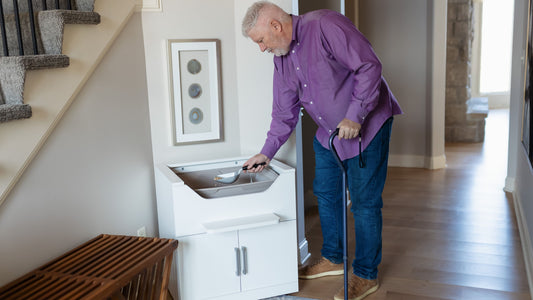 Cane and walker accessible litter box at standing height designed for safe, no-bend cat care