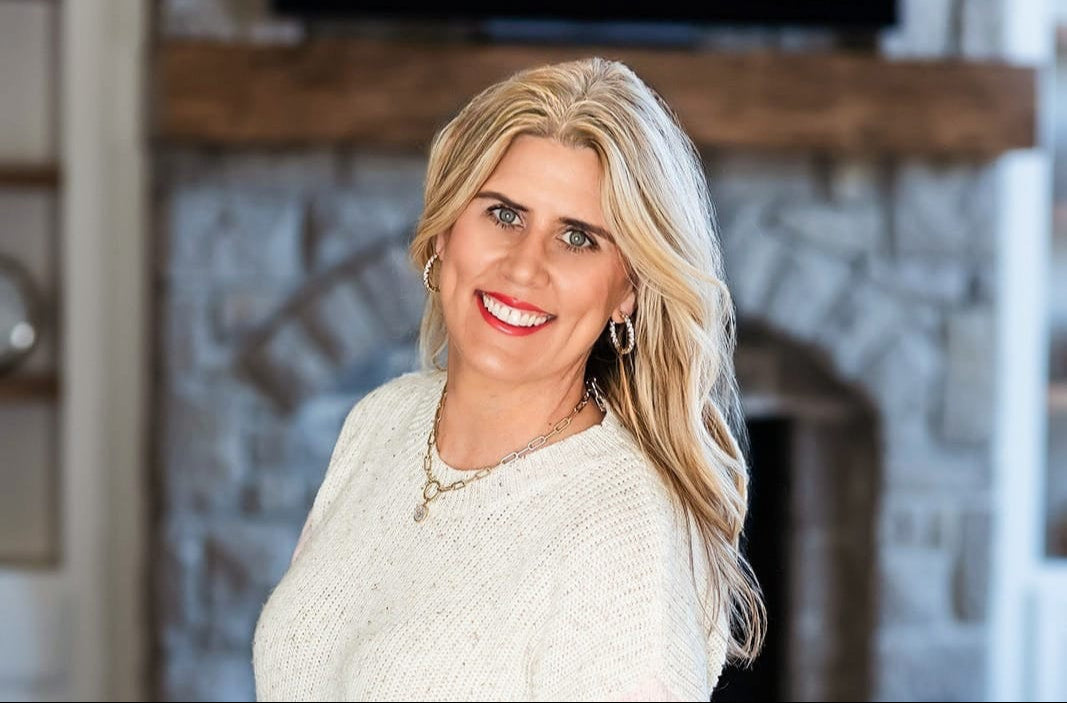 Amy Leiker, LoftyLoo founder, smiling at the camera